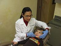 Dentist in Alhambra - Dr. Lieberg with young patient